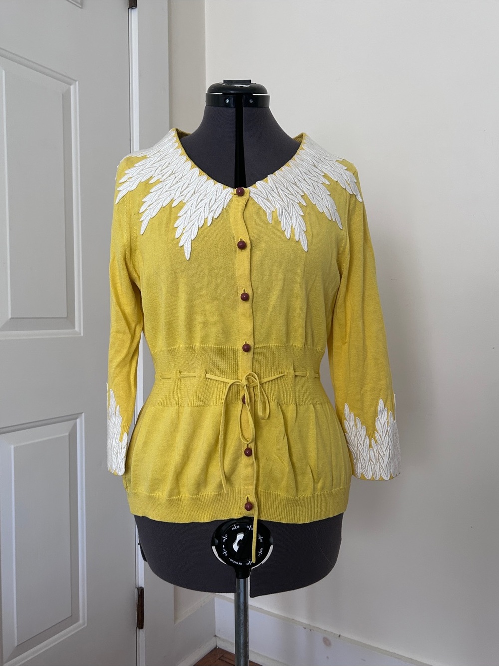 Anthropologie Moth Yellow Cardigan Sweater with White Feather Detail